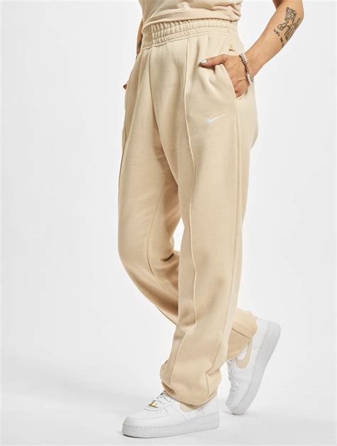 jogginganzug damen nike beige|jogginghose damen hoch.